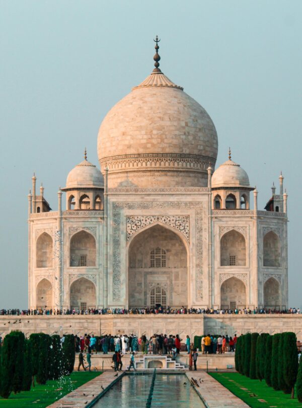 A stunning shot of the Taj Mahal in Agra, showcasing its iconic architecture and serene surroundings.