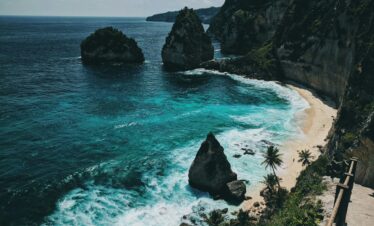 Explore the breathtaking cliffs and turquoise waters of Bali's scenic coastline.